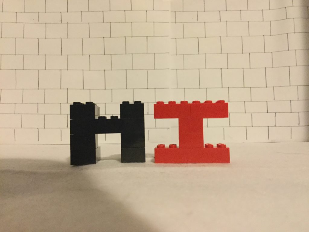 The word HI spelled out with Lego Blocks.